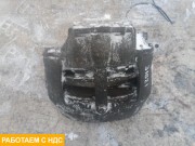 Суппорт тормозной левый